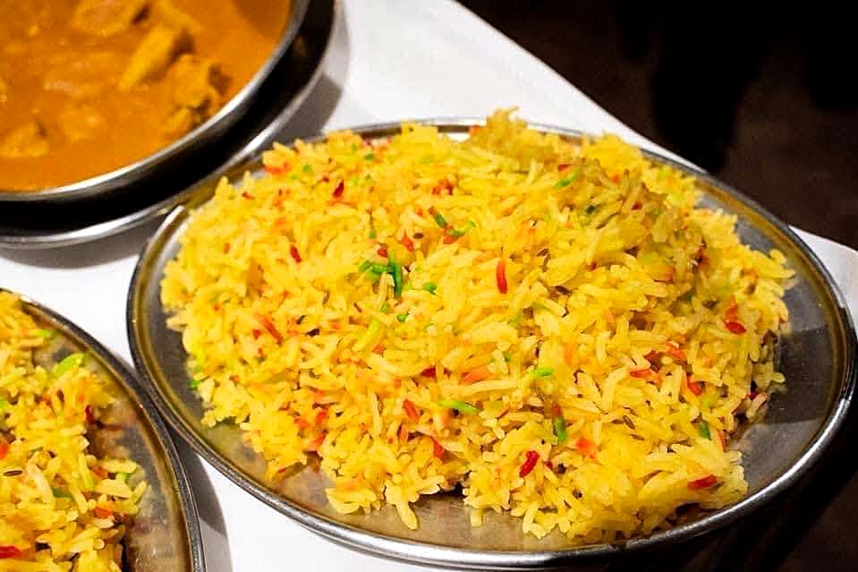 A selection of curries in balti bowls at Buraq, Kirkham